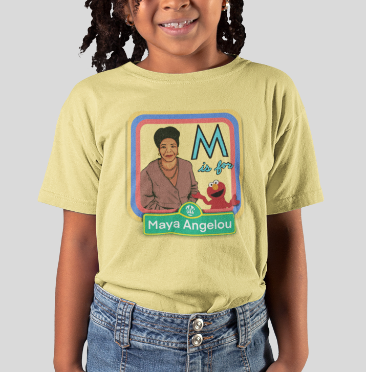 Child wearing a yellow t-shirt with a graphic of Maya Angelou and Elmo, standing against a plain background.